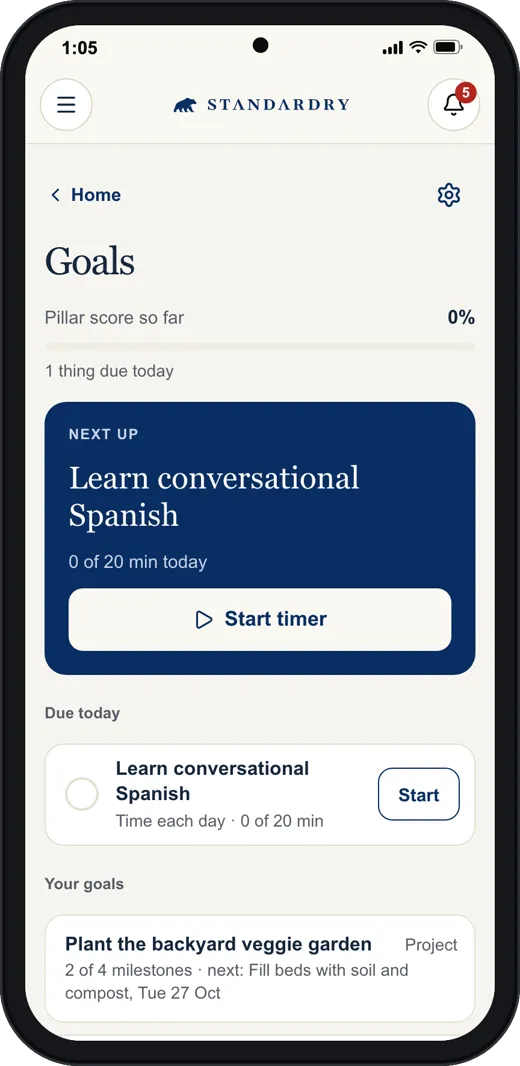 The Standardry Goals screen on a phone: Learn conversational Spanish as the next goal with a Start timer button, and the list of goals below.