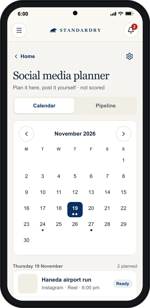 The Social media planner calendar for November on a phone, with posts planned on 19 November.